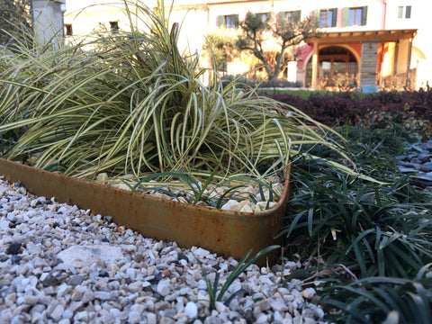 Bordura metalica pentru gradina - delimitare eleganta si sigura a spatiilor verzi